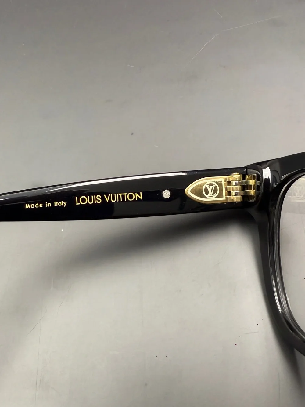 Louis Vuitton Black Frame Glasses with Gold Accents